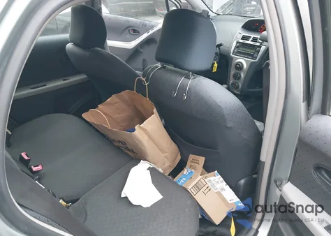 2009 Toyota Yaris from USA, damaged, VIN JTDKT903295227690